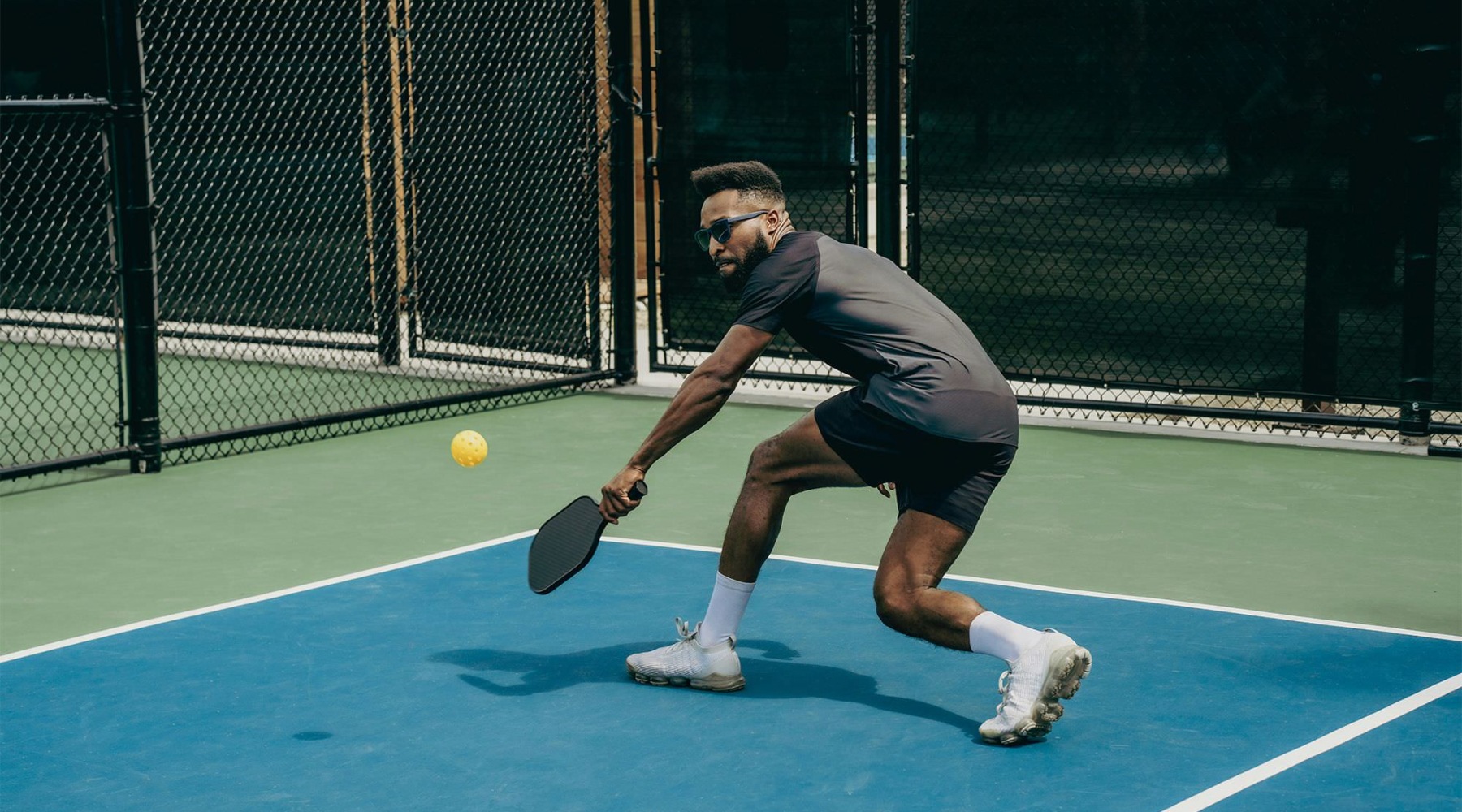 a person holding a tennis racket
