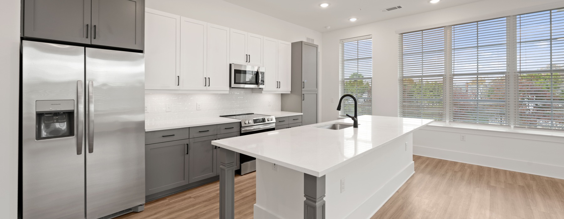 kitchen with bright lighting and ample counter space